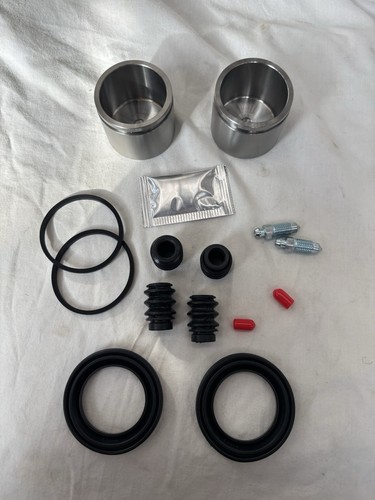 Front caliper pistons - caliper,